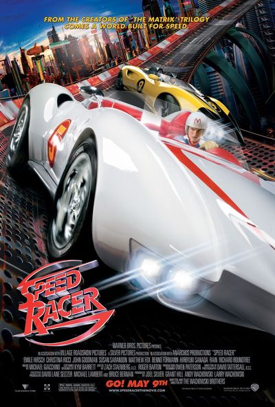 A colourful and futuristic portrayal of racing cars dramatically skidding around a corner. Most prominent in the frame is a white car with red accents, driven by Speed, a white man in a white helmet with a red M, portrayed by Emile Hirsch. Behind him is a yellow car with black accents, driven by Racer X, a white man in a black helmet, portrayed by Matthew Fox. Behind them is a futuristic city scape. In the bottom left corner of the poster is the film's title, "Speed Racer," written in red text resembling a steering wheel.